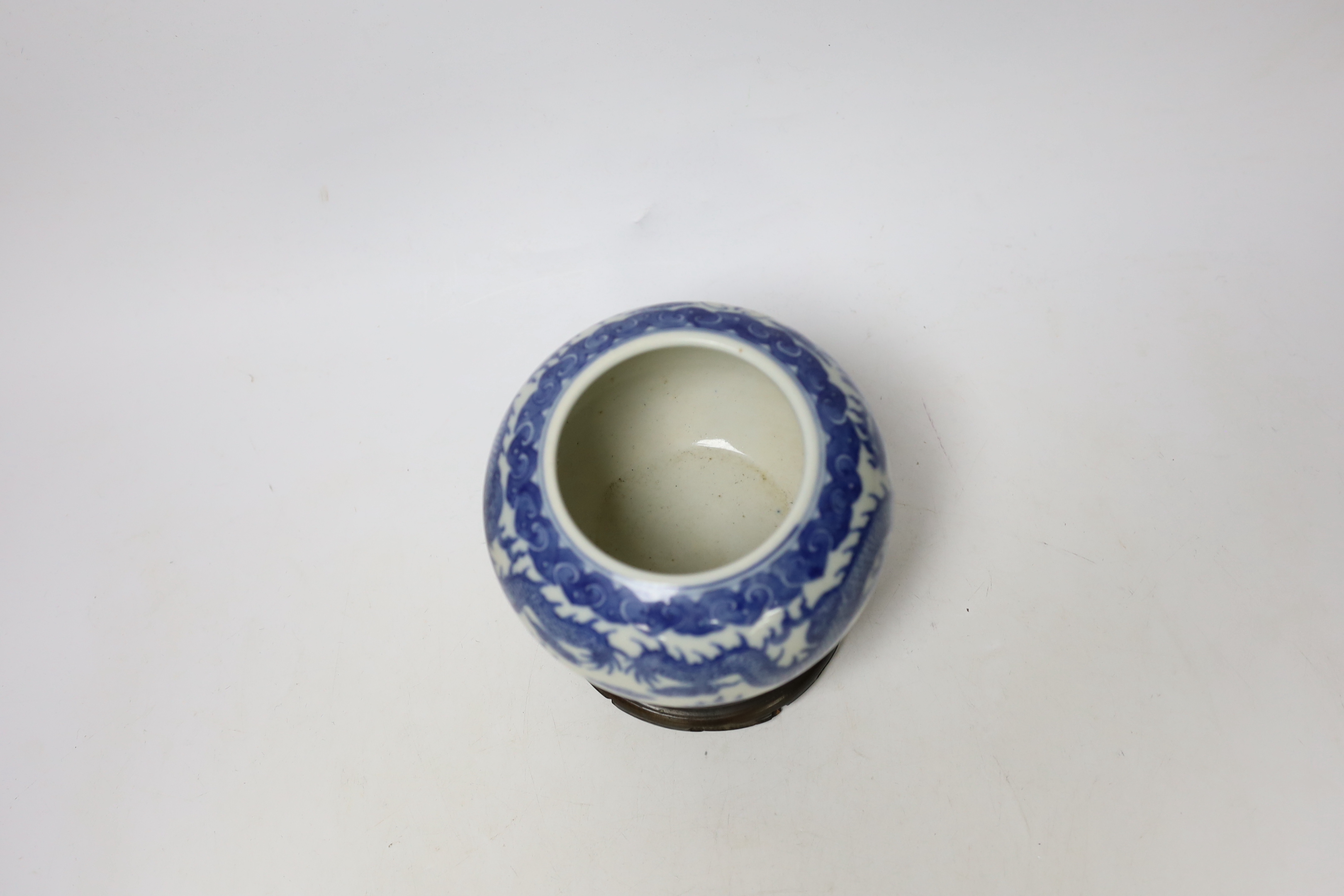 A Chinese blue and white dragon water pot on stand, bowl 12.5cm high including stand